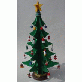 Christmas tree with small ornaments and a yellow star on top